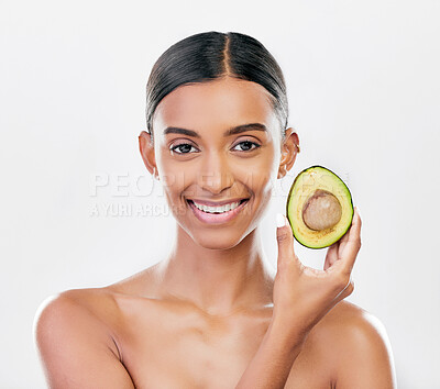 Buy stock photo Facial, avocado and natural beauty, woman with organic cosmetics isolated on white background. Eco friendly skincare, healthy skin glow and female model in portrait, fruit and dermatology in studio