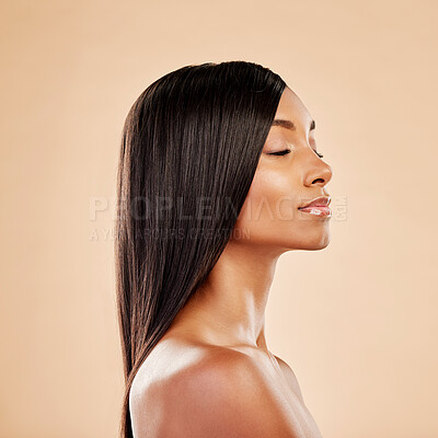 Buy stock photo Beauty, hair care and profile of a woman in studio with natural glow and shine. Hairstyle, cosmetics and wellness of Indian person for hairdresser, makeup or salon results on a beige background