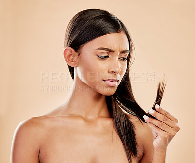 Buy stock photo Hair, split ends and woman with beauty, damage with cosmetics and keratin treatment fail isolated on studio background. Female model, haircare and growth problem with dry texture and mistake