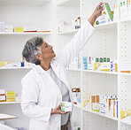 Mature pharmacist woman, shelf and boxes with thinking, packing stock and inventory inspection. Senior dispensary manager, package or product for healthcare, pills or ideas with drugs in retail store
