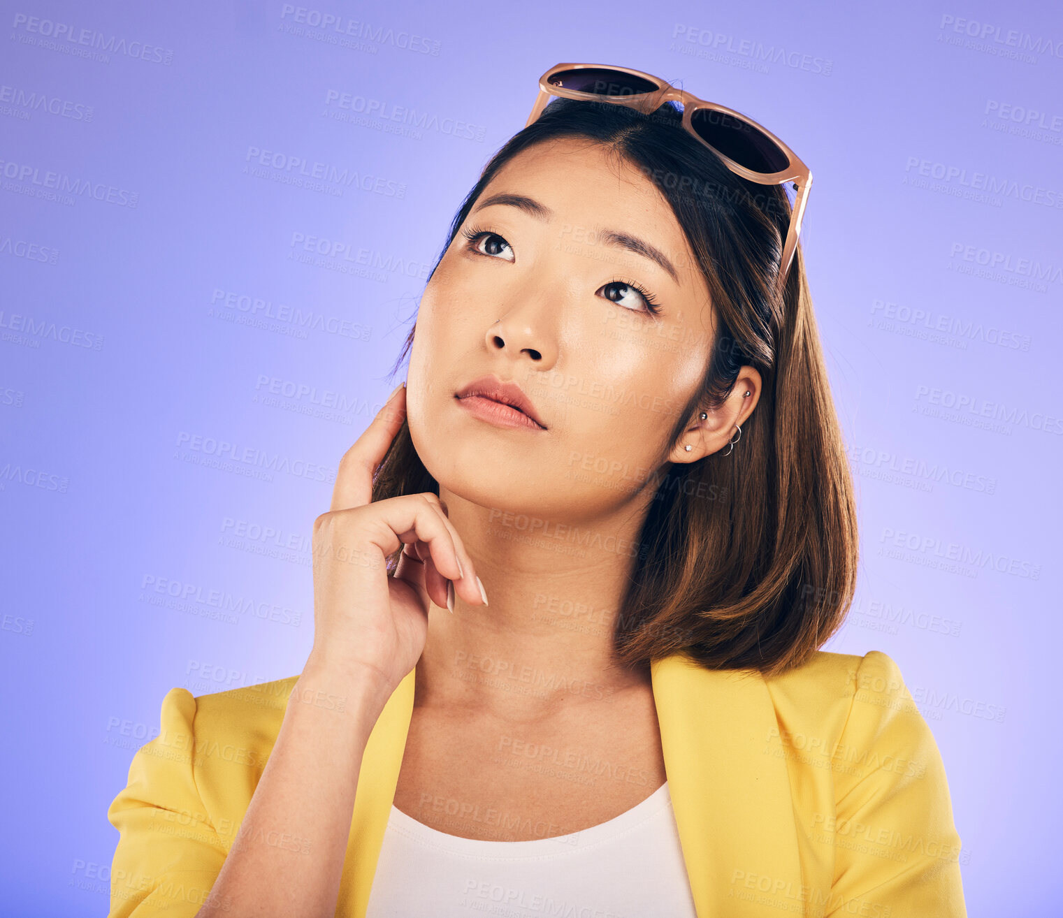 Buy stock photo Decision, idea and asian woman with wonder or choice with purple background in studio with glasses. Contemplating, girl and vision or thoughtful face with doubt for option or solution on mind.