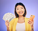 Money, phone and woman in portrait winning, finance or online savings, profit and cash prize. Success, lottery and winner or asian person on mobile, money fan and banking on studio, purple background