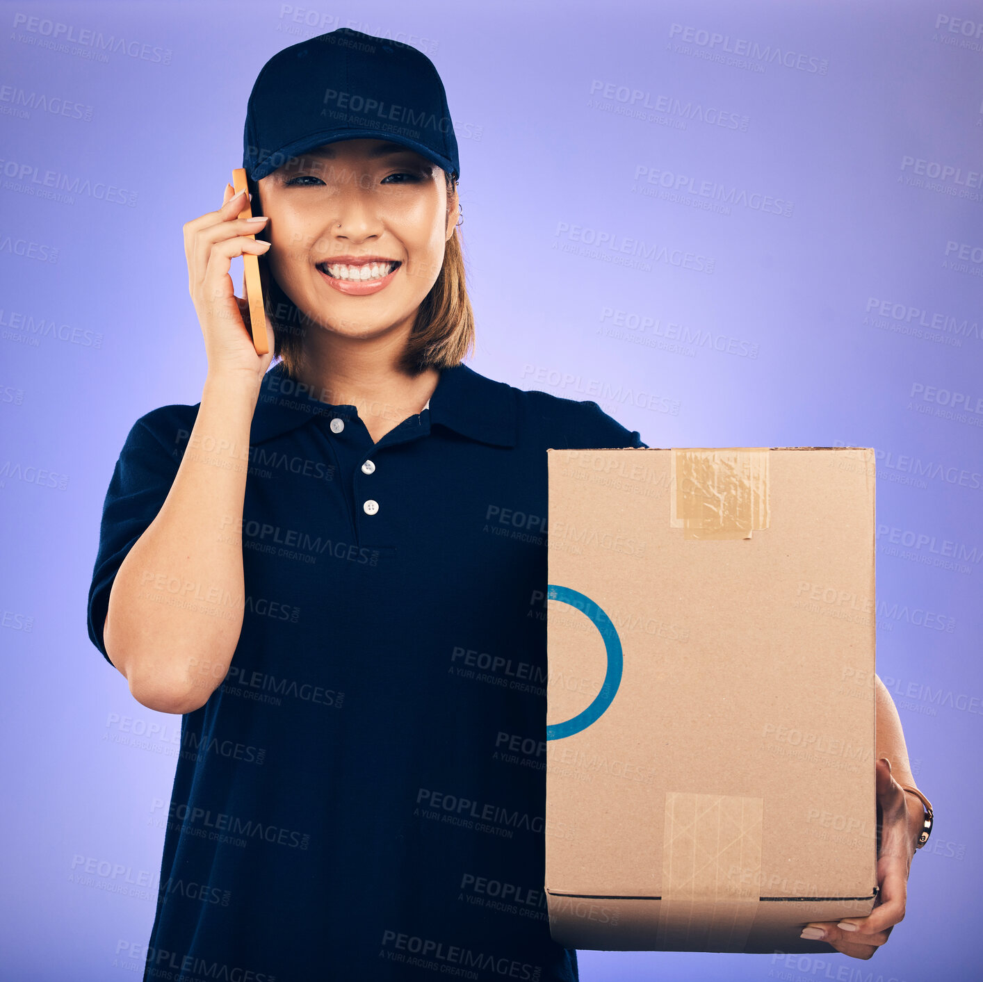 Buy stock photo Happy asian woman, phone call and box for delivery, courier service or logistics against a purple studio background. Portrait of female person talking on smartphone with package, parcel or order