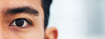 Buy stock photo Half portrait, closeup and eyes of man with mockup for vision, focus and healthcare with test for contact lenses. Zoom, eye exam banner and model looking at healthy lens care and wellness on space