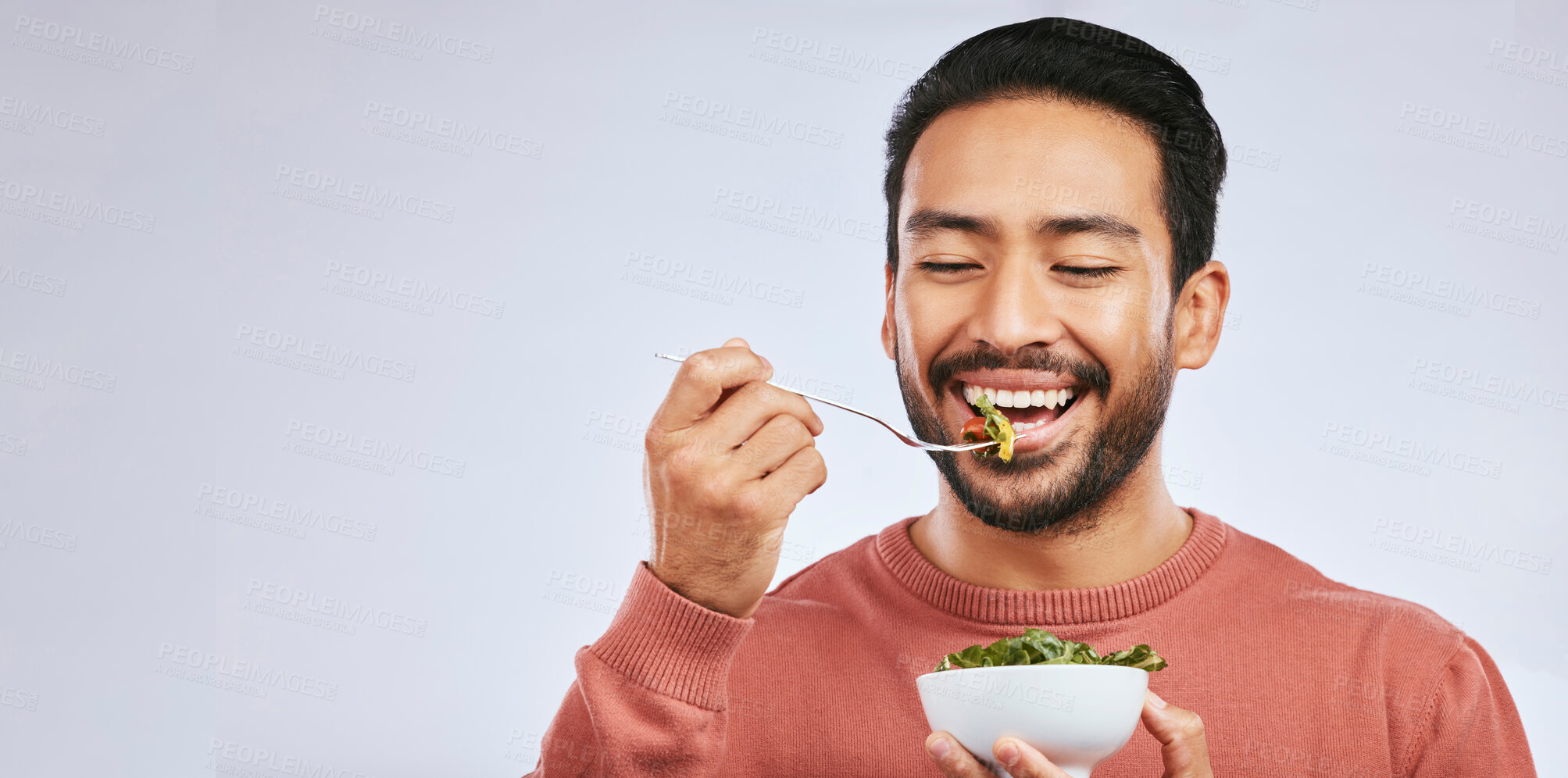 Buy stock photo Fruit, healthy food and happy asian man in studio for health, wellness or detox on grey background. Breakfast, salad and face of guy nutritionist smile for clean, green or raw diet or vegan lifestyle