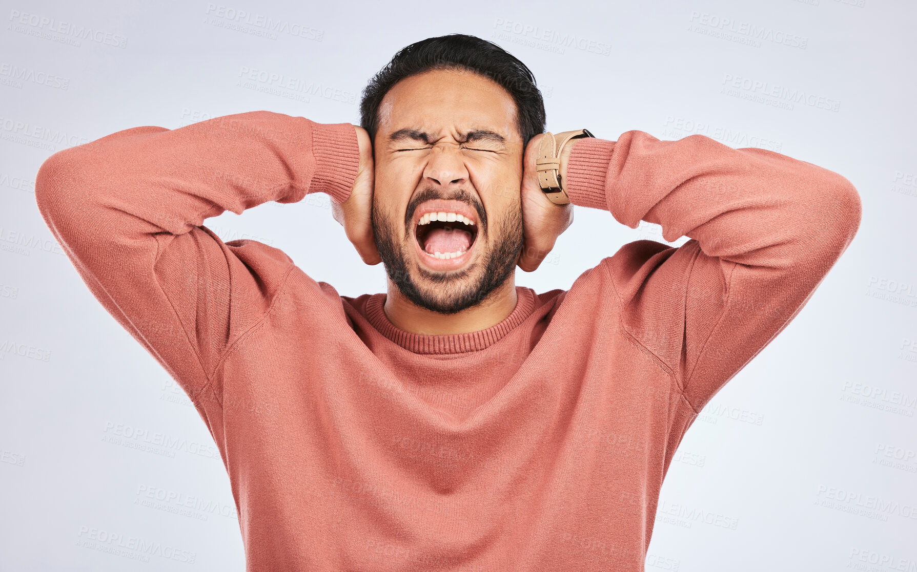 Buy stock photo Shouting, anxiety and hands on ears of asian man in studio with headache, brain fog or frustrated on grey background. Noise, stress and angry guy person scream for tinnitus, depression or vertigo