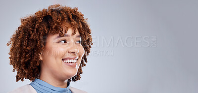 Buy stock photo Thinking, space and happy with face of woman in studio for idea, promotion and mockup. Smile, banner and announcement with female person on grey background for happiness, news and advertising