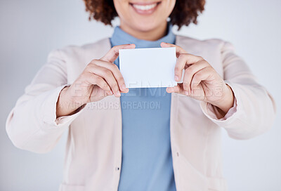 Buy stock photo Mockup, business card and hands with woman in studio for advertising, logo or information. Promotion, contact us or announcement with closeup of person and paper on white background for show and sign