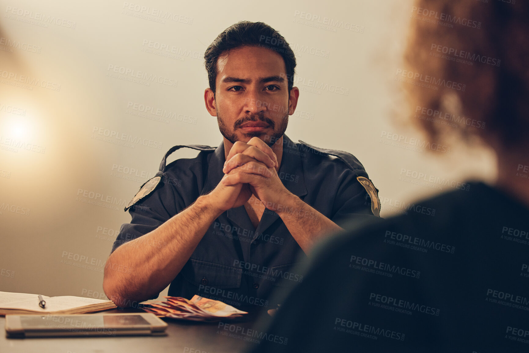 Buy stock photo Police, investigation and man listening to woman for report, interrogation or criminal arrest. Law, crime and bribery, detective at station for money laundering interview, questions and attention.