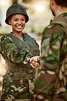 Soldier, army and man and woman with handshake in nature for service, protection and thank you. Camouflage, national military and people shaking hands for veteran honor, greeting and official duty
