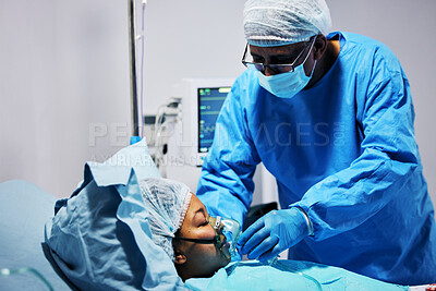 Buy stock photo Healthcare, doctor and patient with oxygen in emergency surgery, professional care and hospital bed. Breathing, help and air, surgeon with person in operation, mask to check health in medical results