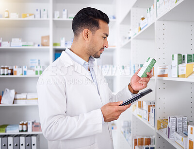 Buy stock photo Man, pharmacist and tablet for pills, stock check and reading in pharmacy store. Technology, inventory medicine and medical doctor with pharmaceutical drugs, medication or supplements for healthcare.