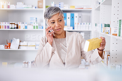 Buy stock photo Phone call, woman in pharmacy with box of medicine, consulting for healthcare product information. Telehealth, pharmaceutical advice and senior person with decision, choice and cellphone consultation