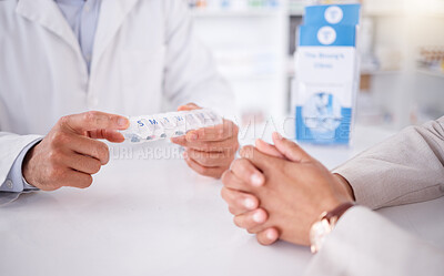 Buy stock photo Closeup, client or pharmacist with a product, hands or discussion with container with healthcare. Zoom, human or medical professional with a box, wellness or treatment in a drug store or prescription