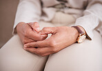 Hands, depression or anxiety with a woman patient closeup on a sofa for mental health or psychology. Stress, healthcare and medical with a nervous female person sitting in an office of a psychologist