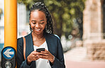 Happy black woman, phone and city for travel, social media or communication in Cape Town. African female person with smile for chatting, texting or networking on mobile smartphone app by street robot