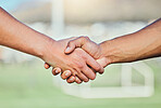Football, team handshake and partnership at stadium for sports deal, support or agreement. Collaboration, shaking hands and soccer players welcome to game, competition and workout for exercise match.