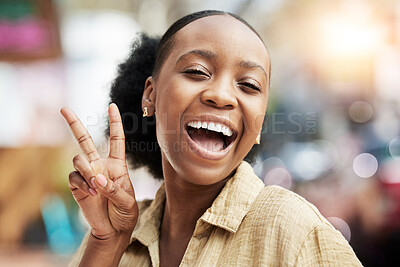 Buy stock photo Portrait, smile and peace with an excited black woman on a blurred background posing for a photograph. Face, emoji and profile picture with a happy young female comic looking  playful while laughing