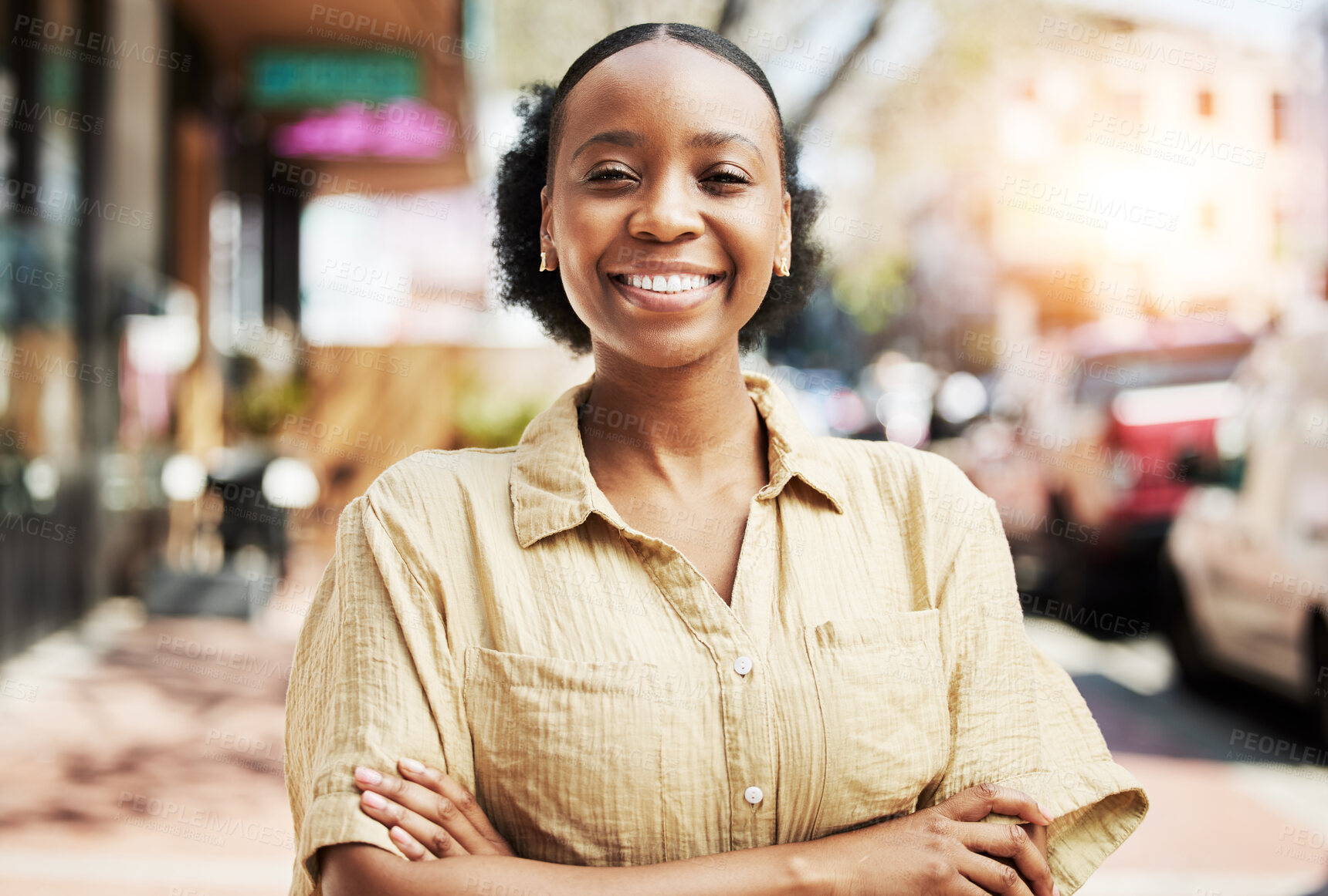 Buy stock photo Happy, smile and portrait of woman in the city walking for exploring, travel or sightseeing. Happiness, excited and headshot of African female person with crossed arms for confidence in an urban town