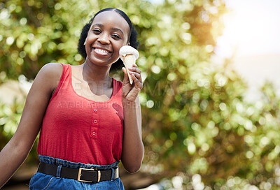 Buy stock photo Happy, portrait and a black woman with ice cream in nature for a summer dessert or treat. Smile, mockup and an African girl eating a cold and frozen cone while hungry in a park or garden in spring