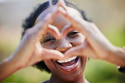 Buy stock photo Happy black woman, portrait and face with heart hands for love, care or healthy wellness in nature. African female person smile with like emoji, symbol or icon and hand gesture for romance outdoors