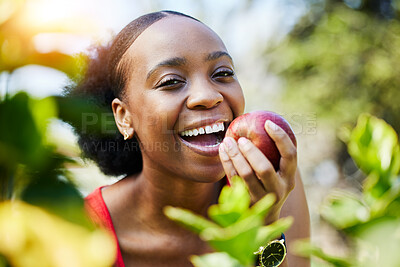 Buy stock photo Apple, health and portrait of a black woman biting a fruit on a farm with fresh produce in summer and smile for wellness. Happy, nutrition and young female person on an organic diet for self care