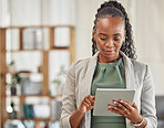 Black woman, tablet and planning in office for business information, data analysis or internet research. Female employee working on digital technology for online connection, website and scroll on app