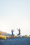 Mountain, celebration and male athletes cycling on bicycles training for race or marathon in nature. Sports, fitness and men cyclists cheering while riding bike for cardio exercise on outdoor trail.