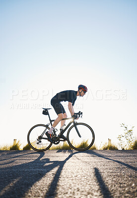 Buy stock photo Mountain, fitness and man athlete on bicycle cycling training for a race or marathon in nature. Sports, workout and male cyclist riding a bike for cardio exercise on an outdoor off road trail.