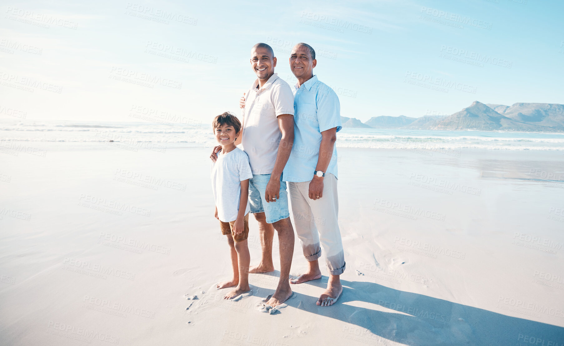 Buy stock photo Happy, portrait and family at the beach with a child for walking, holiday or bonding in summer. Smile, male generation and a father, grandfather and kid at the ocean for travel, vacation or together