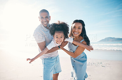 Buy stock photo Beach, portrait and parents flying their kid on the sand by the ocean on a family vacation. Happy, smile and girl child playing and bonding with her young mother and father on tropical summer holiday