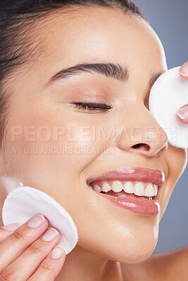 Buy stock photo Skincare, cotton pad and asian woman in studio for makeup removal, toner or hydration on grey background. Face, beauty and asian lady wellness model with facial swab for cleaning or glowing skin 