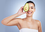 Avocado, skincare and portrait of asian woman in studio happy with detox, wellness or omega 3 treatment on grey background. Fruit, face and lady model smile for anti aging or vitamin c facial beauty