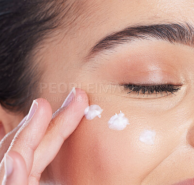 Buy stock photo Skincare, closeup and woman with cream on face, anti ageing and collagen treatment for skin glow. Dermatology, cosmetics and morning beauty routine, facial lotion on model with moisturiser product.