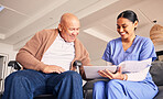 Old man, wheelchair or caregiver reading documents, history or healthcare documents at nursing home. Smile, medical records or happy nurse showing senior patient or elderly person with a disability 