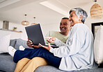 Mature couple, laptop and relax on sofa in living room, download media and choice of watching movie together. Happy man, woman and computer for streaming online video, web subscription and internet