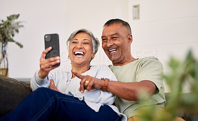 Buy stock photo Love, phone and senior couple laughing at funny social media meme, online comic or streaming comedy video. Smartphone application, marriage humour and elderly people laugh at retirement joke at home