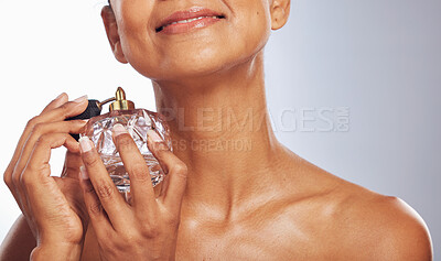 Buy stock photo Woman, spray and perfume for beauty in studio, white background or aesthetic product of fresh scent. Closeup of happy female model with fragrance cosmetics, parfum application and bottle of cologne