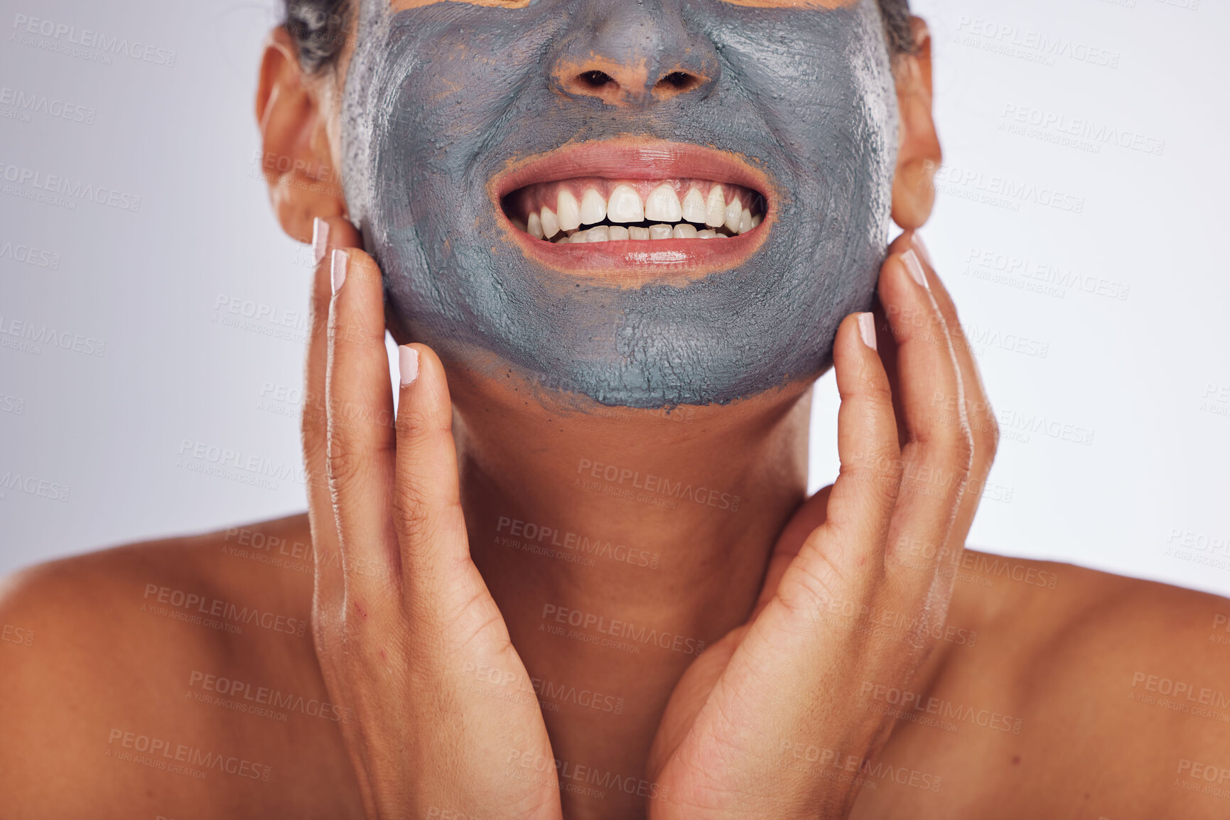 Buy stock photo Woman, smile and charcoal mask on face for beauty, aesthetic dermatology or self care on white background in studio. Closeup of happy female model with clay skincare product, facial cosmetics or glow