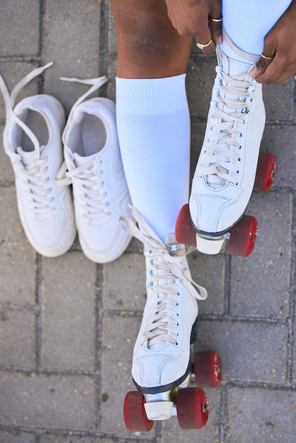 Buy stock photo Above, skating and legs of a woman in the street for summer fun, a hobby and getting ready for a derby. Shoes, vintage and the feet of a girl or person playing with outdoor skates in the road