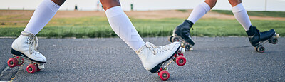 Legs, roller skates and shoes of friends on street for exercise, workout or training outdoor. Skating, feet of people and sports on road to travel, journey and moving for freedom, hobby and fitness