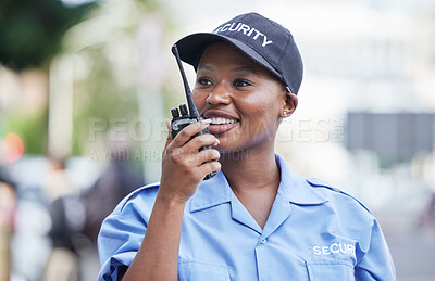 Buy stock photo Woman, security guard and radio in street, city and communication for contact, backup or safety with smile. African protection agent, audio tech and talk with info in metro, cbd or road to stop crime