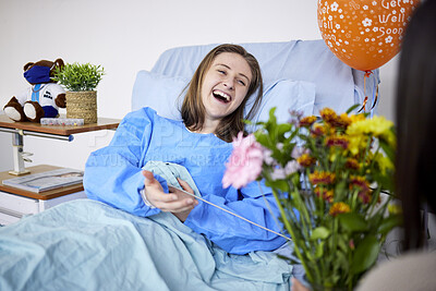 Buy stock photo Sick, hospital patient and visitor with flowers at bed with a woman in recovery with support. Healthcare, medical insurance and person with good service, family and care with get well soon balloons  