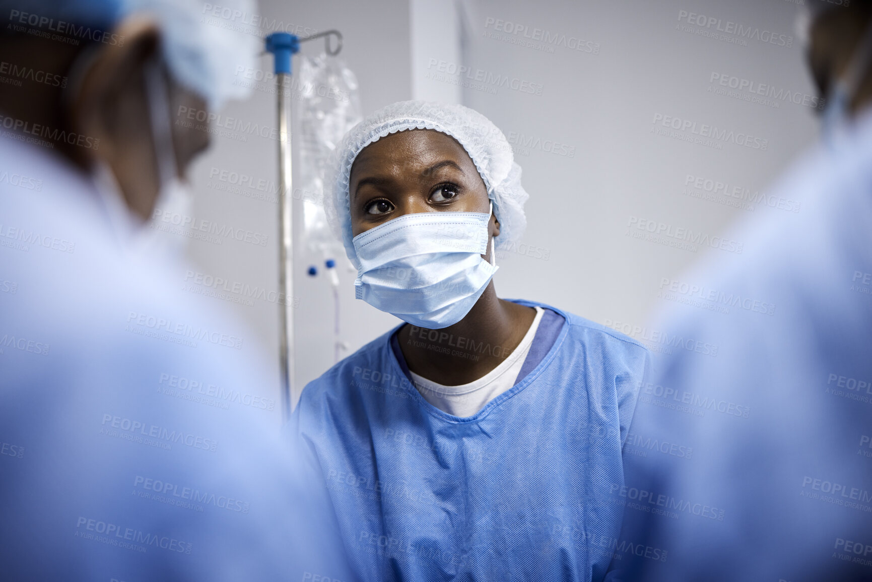Buy stock photo Surgery, teamwork or surgeons with mask for emergency, accident or healthcare in hospital clinic. Doctors, medical or African nurses in surgical collaboration helping in operating room with support 