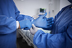 Surgery, hands or surgeons with gloves for operation procedure or healthcare crisis in hospital. Team, medical safety tools or closeup of doctors helping in operating room in clinic with protection 