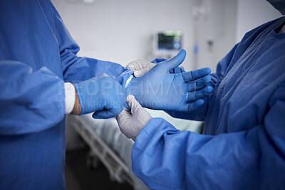 Buy stock photo Surgery, hands or surgeons with gloves for operation procedure or healthcare crisis in hospital. Prepare, medical team tools or closeup of doctors helping in operating room in clinic with protection 