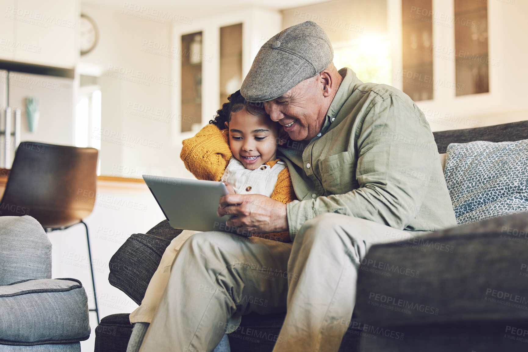Buy stock photo Girl kid, grandfather with tablet on sofa and relax together, watch cartoon or elearning games at home. Bonding, love and spending quality time, old man and female child with gadget and internet