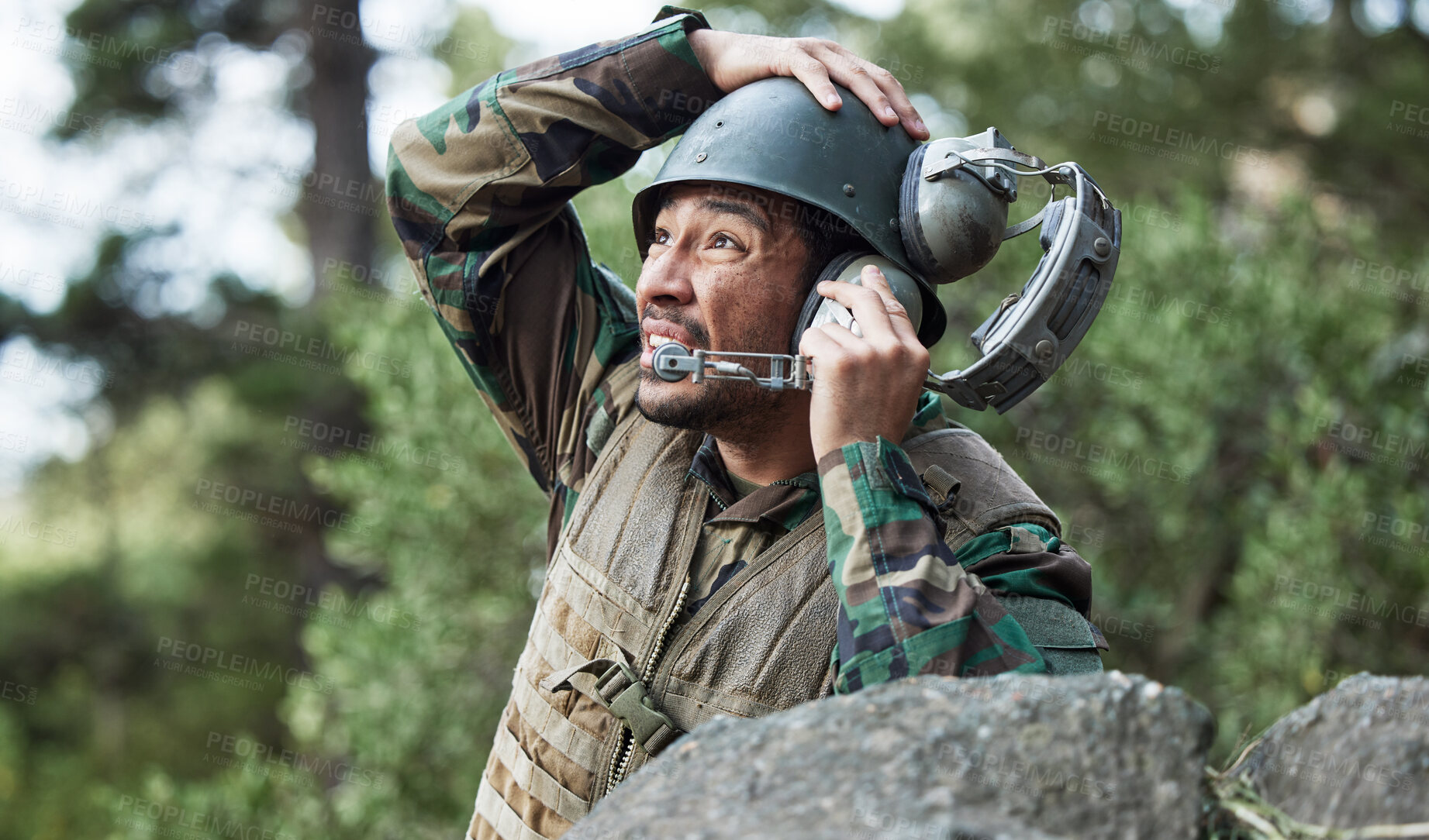 Buy stock photo Military, soldier talking on a radio and communication with leadership in war or officer in army training with technology in emergency. Contact, control room and discussion of conflict or battlefield