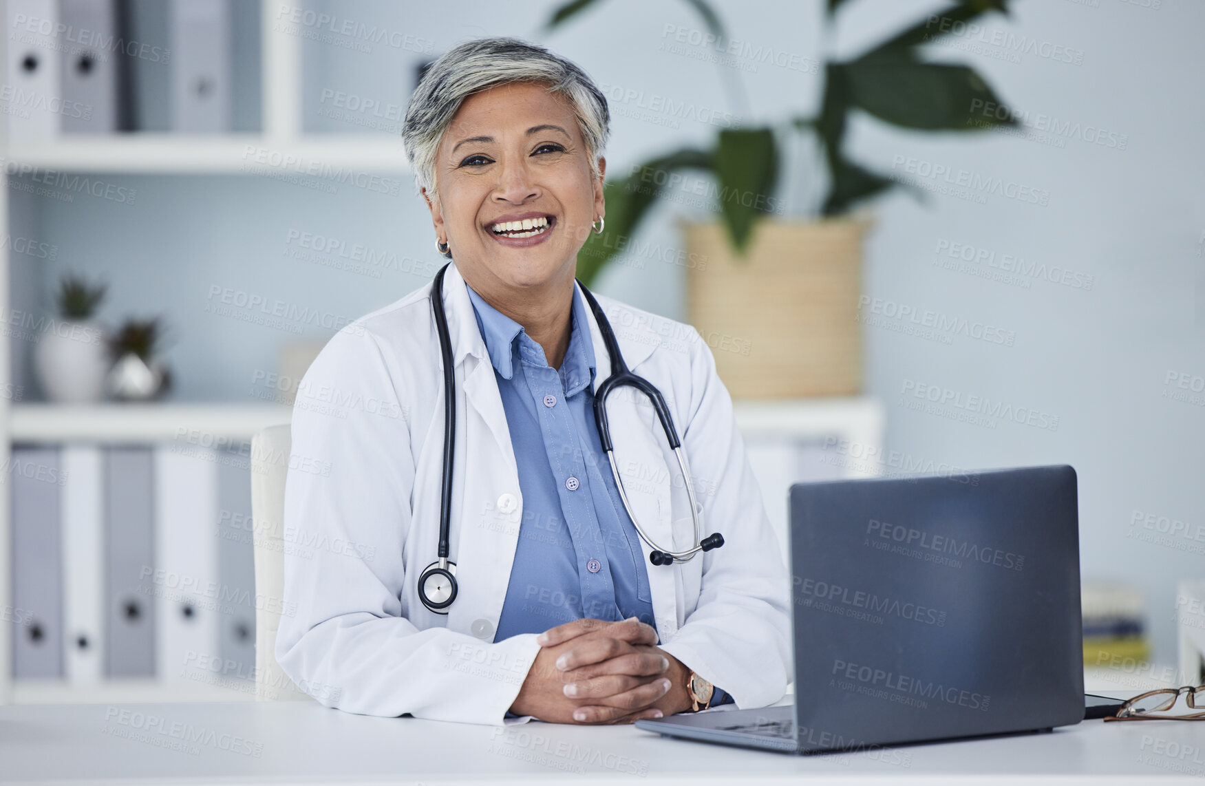 Buy stock photo Doctor, happy portrait and woman in office for medical consultation, support and services planning or advice. Face of healthcare worker or senior person on laptop of health insurance or online clinic
