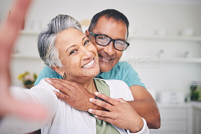 Buy stock photo Selfie, face and old couple, love and memory with happiness, bonding and care with man and woman at home. Portrait, hug and smile in picture, social media post and happy people with photography